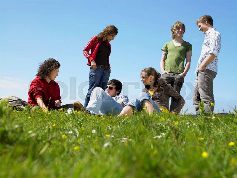 Group of young people relaxing, stock photo