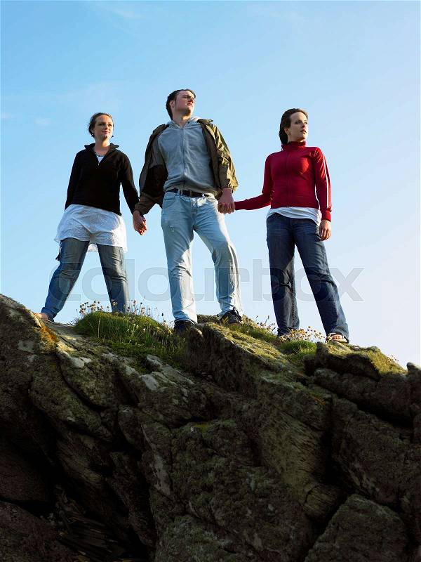 Three young people outdoors, stock photo
