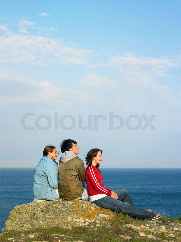 Three young people outdoors, stock photo