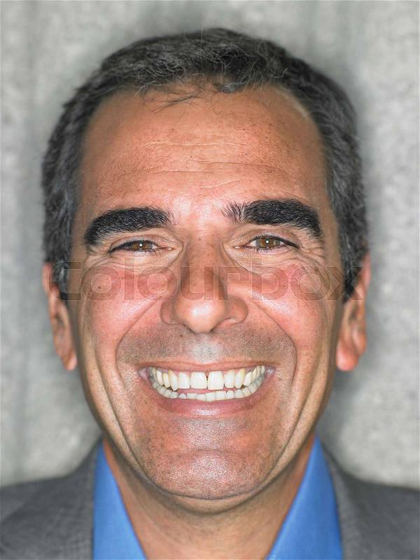 Close up portrait of older man smiling, stock photo