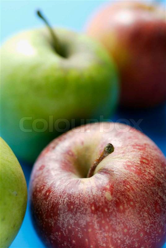 Close-up of four apples, stock photo