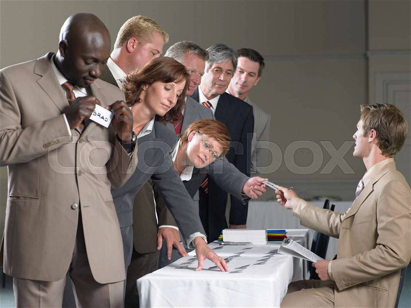 Office workers with name tags, stock photo