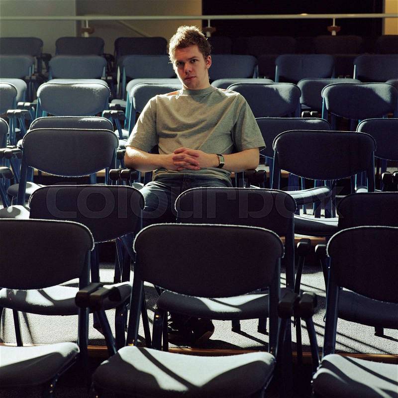 Student at lecture hall, stock photo