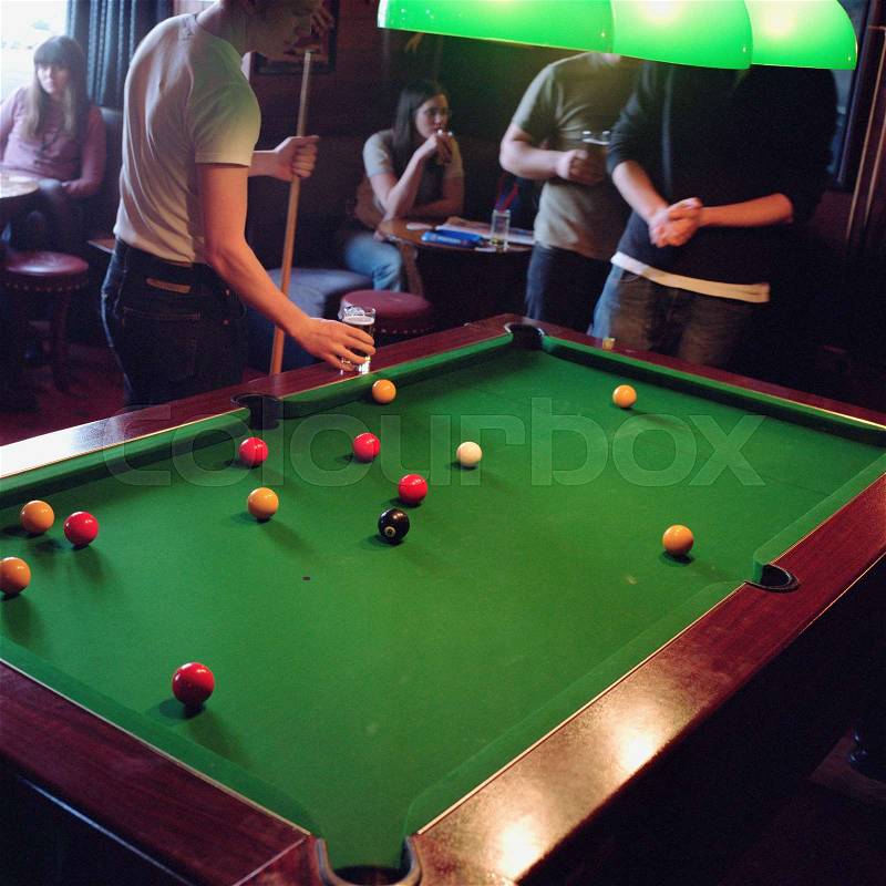 Students playing pool, stock photo