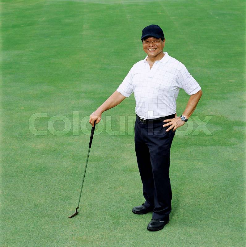 Portrait of a male golfer, stock photo