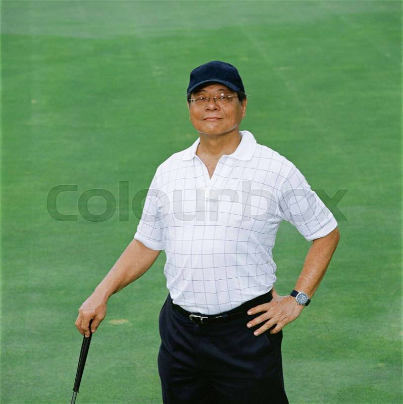 Portrait of a male golfer, stock photo