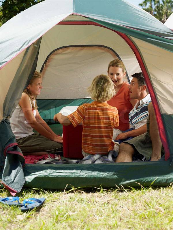 Family in a tent, stock photo