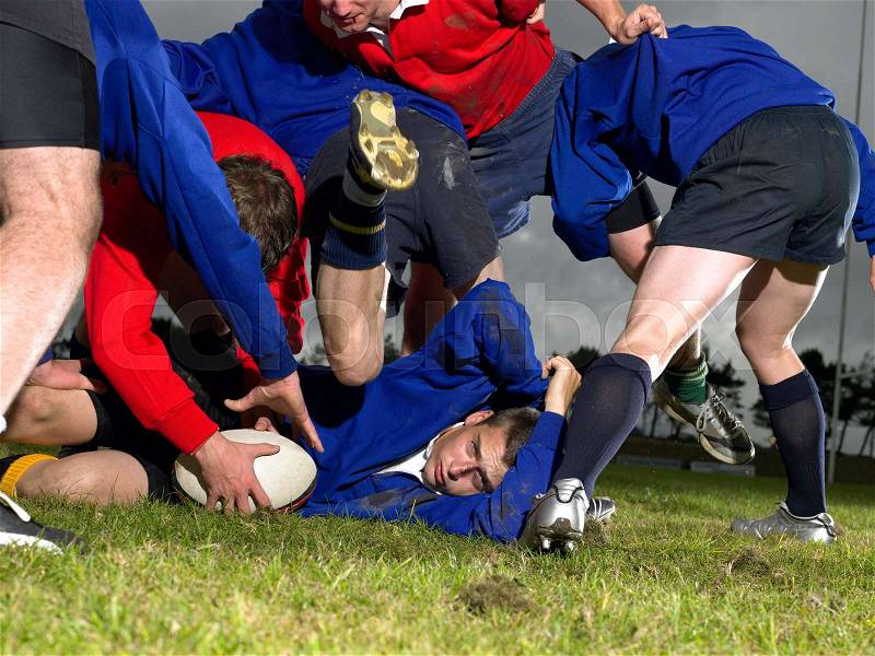 Playing rugby, stock photo