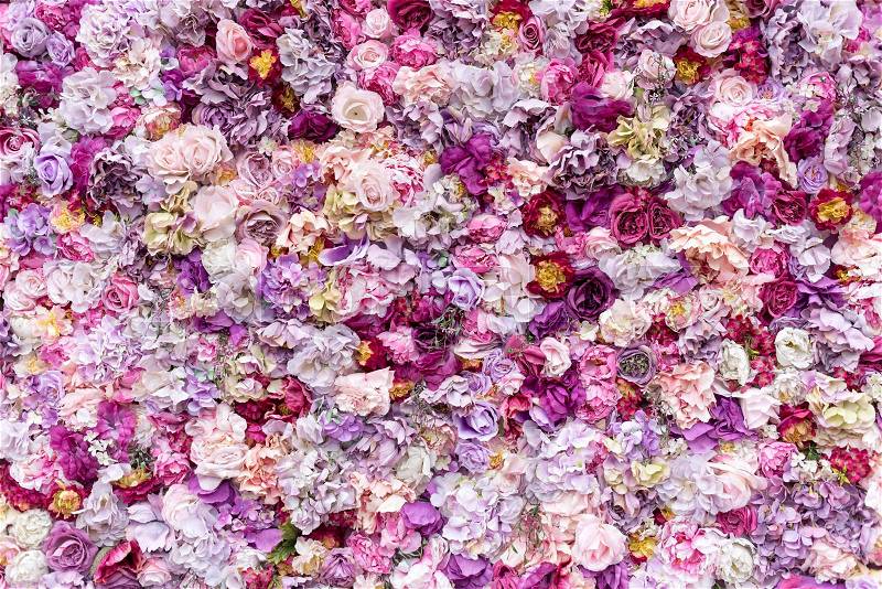 Flower texture background for wedding scene. Roses, peonies and hydrangeas, artificial flowers on the wall, stock photo