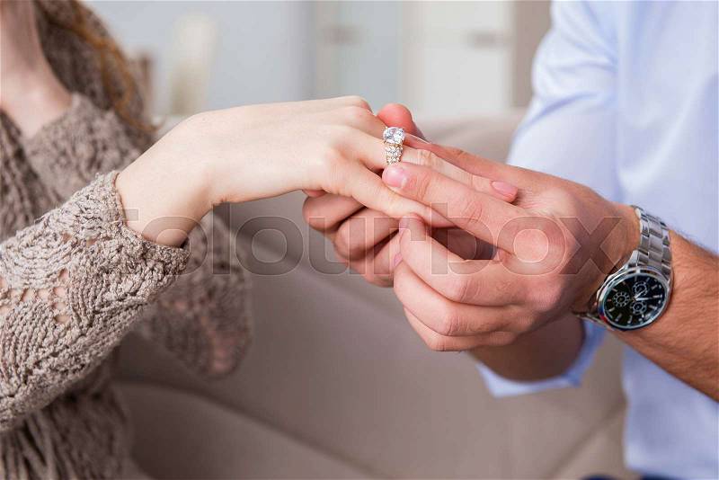 Romantic concept with man making marriage proposal, stock photo