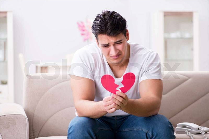Young man in sad saint valentine concept, stock photo