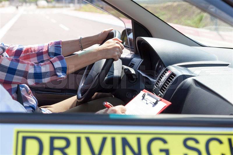 Learning to drive a car. Driving school, stock photo