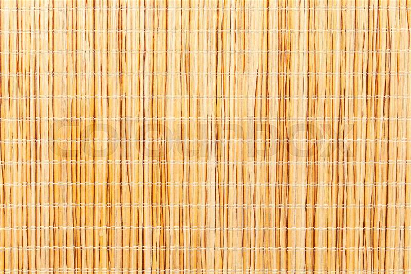 Brown bamboo straw mat. Macro. Photo can be used as a whole background, stock photo