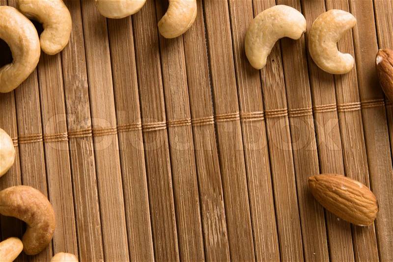 Background made of cashew and almond, stock photo