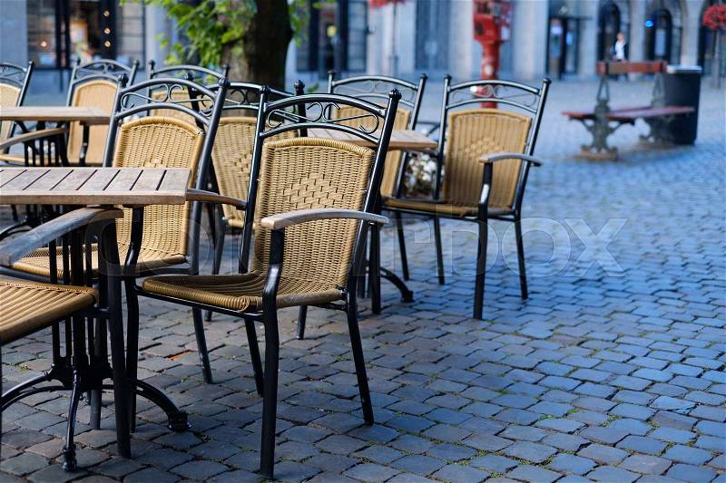 Cafe chairs outside in a street, food restaurant bistro, stock photo