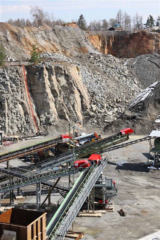 Belt conveyors and mining equipment in a quarry, stock photo