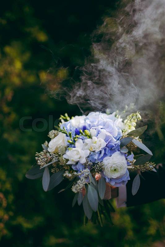Beautiful bouquet of the bride in different color tones, stock photo