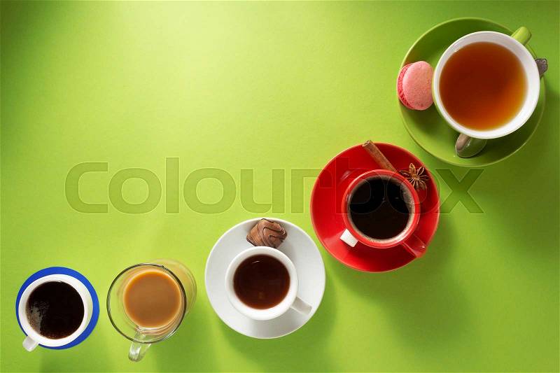 Cup of coffee, tea and cacao at paper background, stock photo