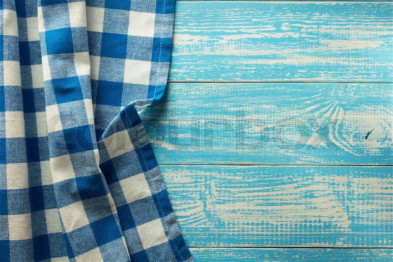 Cloth napkin on wooden background, stock photo