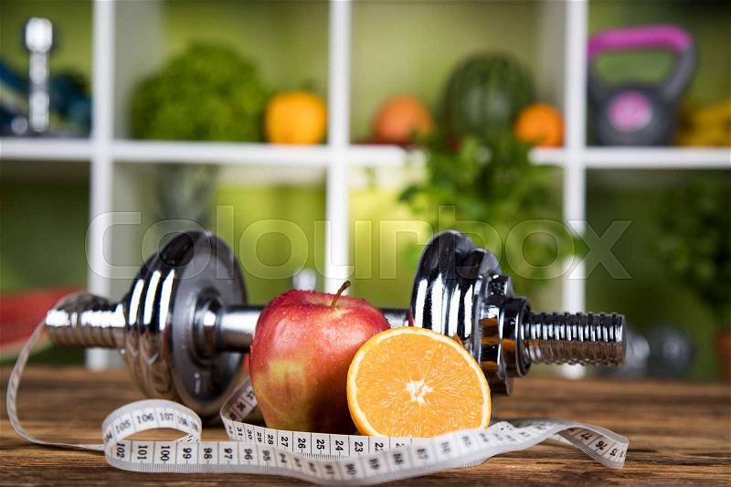 Sport, fitness, dumbbell and diet concept, stock photo