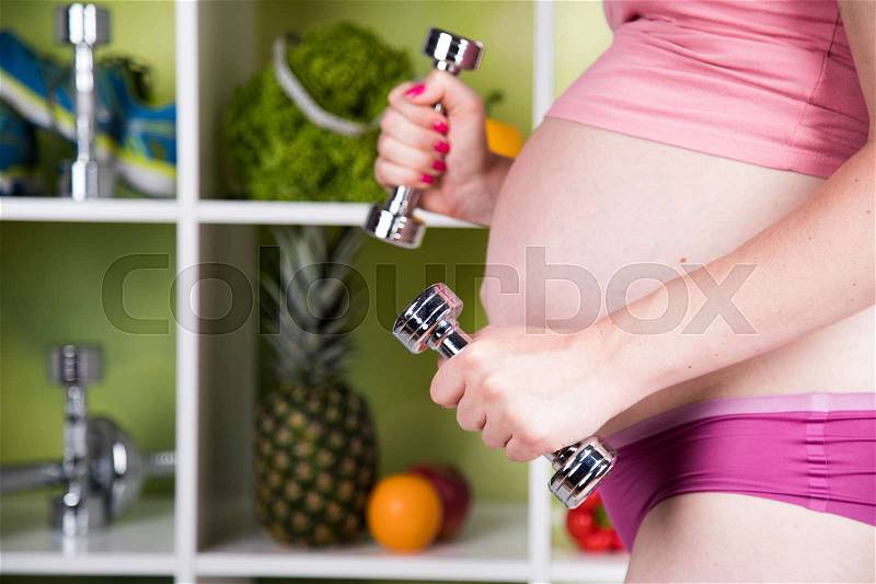 Fitness Pregnancy woman, healthy lifestyle concept, stock photo