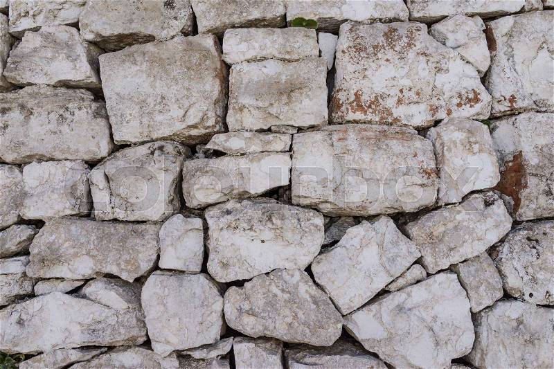 Rustic ancient handcraft tile stack stone wall as background in Italy, stock photo