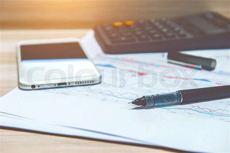 Keyboard, pen, tablet and documents. Vintage tone, stock photo