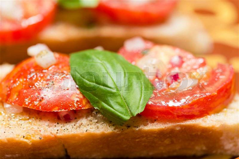 Country bread with black zebra tomato and olive oil, stock photo
