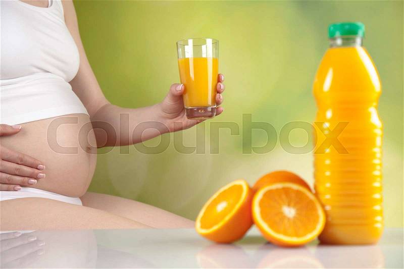Pregnancy, sport, fitness, healthy lifestyle concept, stock photo