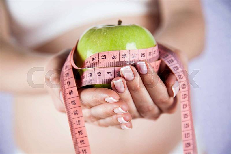 Apple, Pregnancy woman, healthy lifestyle concept, stock photo