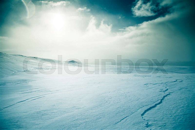 A beautiful, minimalist landscape of snowy Norwegian hills. Clean, light, high key, decorative look, stock photo