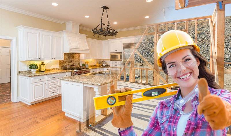 Female Construction Worker In Front of House Framing Gradating to Finished Kitchen Photo, stock photo