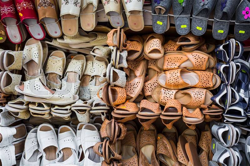 Leather shoes at traditional market, stock photo