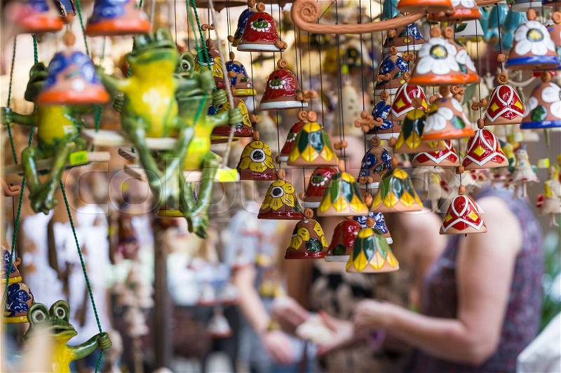 Ceramic bells as a souvenir in local traditional market, stock photo