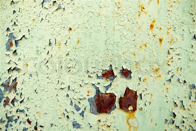 Old rusty metal painted with green paint as background , stock photo