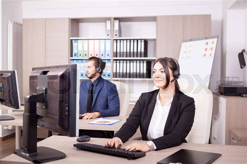 Customer support line woman worker. Help desk and support, stock photo