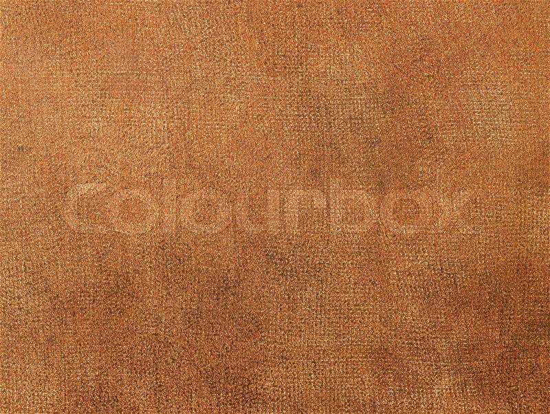 Abstract metallic background showing the detail of a rough copper plate, stock photo