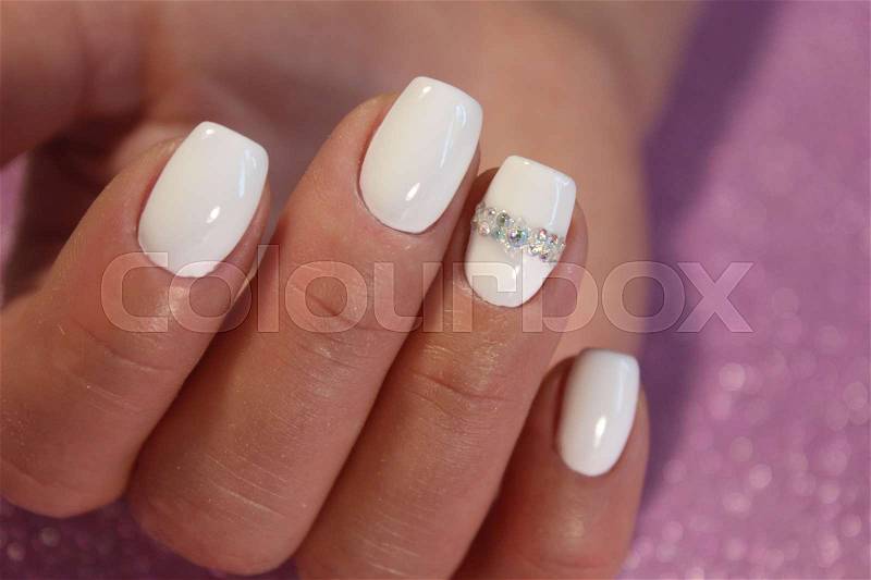 Beautiful manicure gel with lacquer, Only the best this year, stock photo