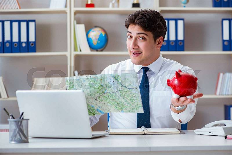 Businessman traveling agent working in the office, stock photo