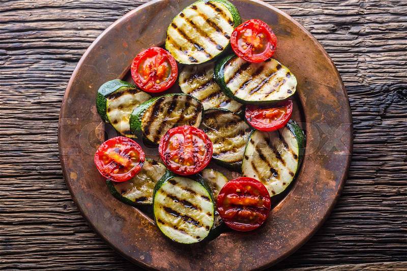 Griledl seasonal vegetable tomatoes and zucchini. Grill food, stock photo