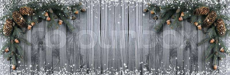 Christmas banner with snow frame, spruce branches, pine cones and acorns. Winter holidays concept. , stock photo