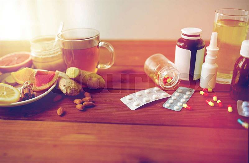 Health, traditional medicine and ethnoscience concept - natural and synthetic drugs on wooden table, stock photo