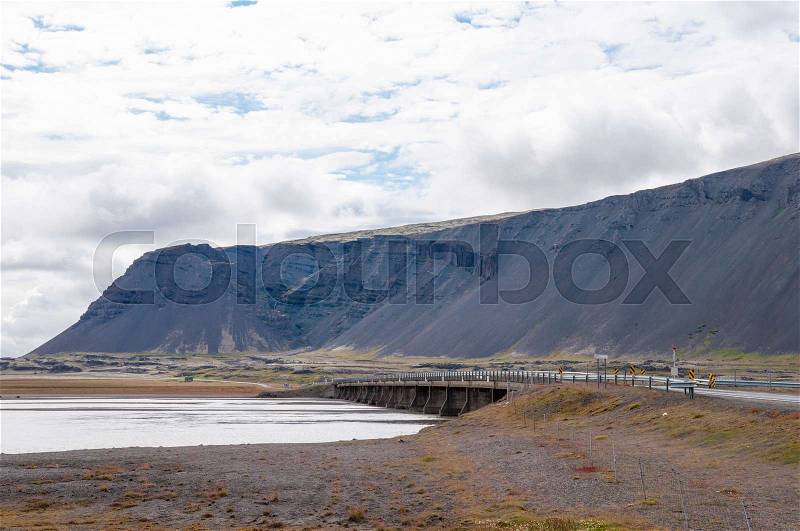 Bridge crossing river Hornafjardarfljot in east Iceland, stock photo