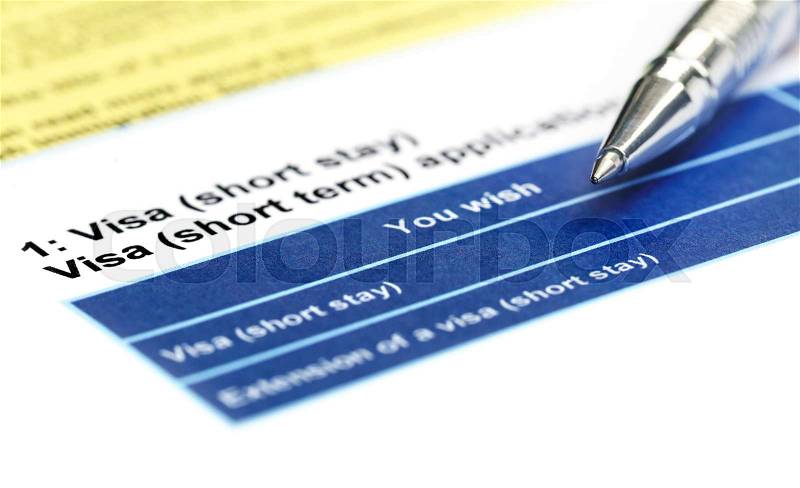 Visa application form details with ballpoint, stock photo