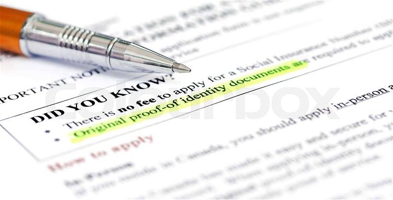 Document checklist for Visa application Canada with a ballpoint, stock photo