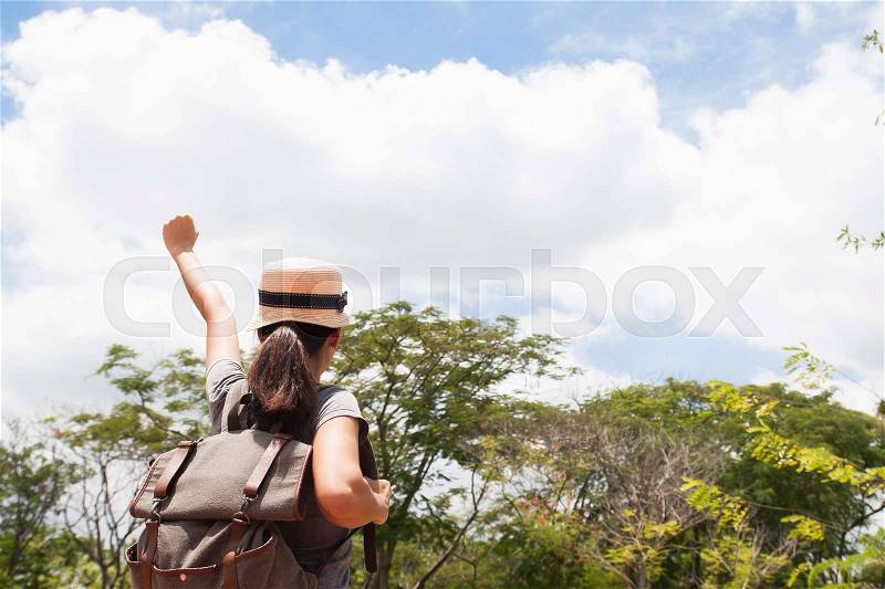 Freedom traveller asian woman enjoying beautiful forest and fresh air, Travel and lifestyle concept, stock photo