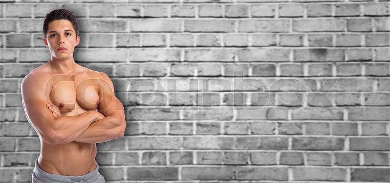 Bodybuilder bodybuilding muscles strong muscular copyspace upper body young man copy space, stock photo