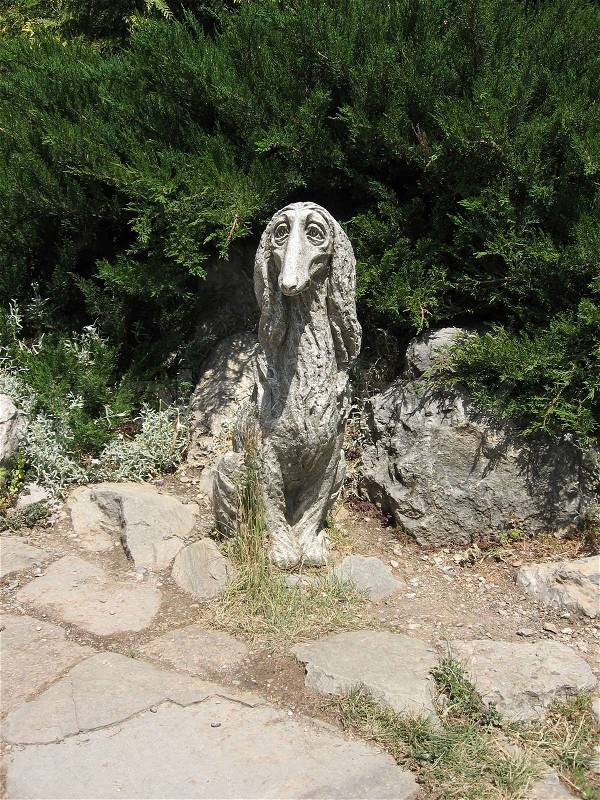 Photo of the dog sculpture, landscape design, stock photo
