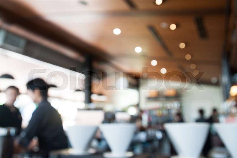Blurry background in coffee shop, stock photo