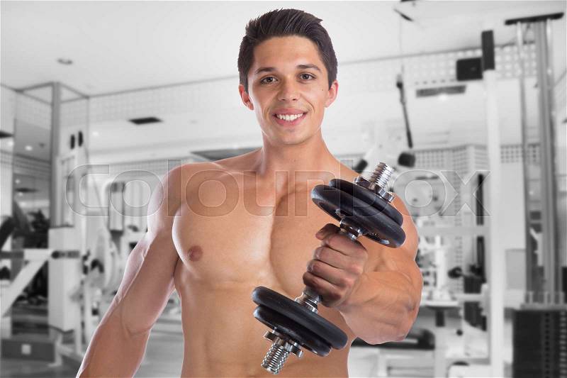 Bodybuilder bodybuilding muscles body builder building gym strong fun muscular young man dumbbell training studio, stock photo